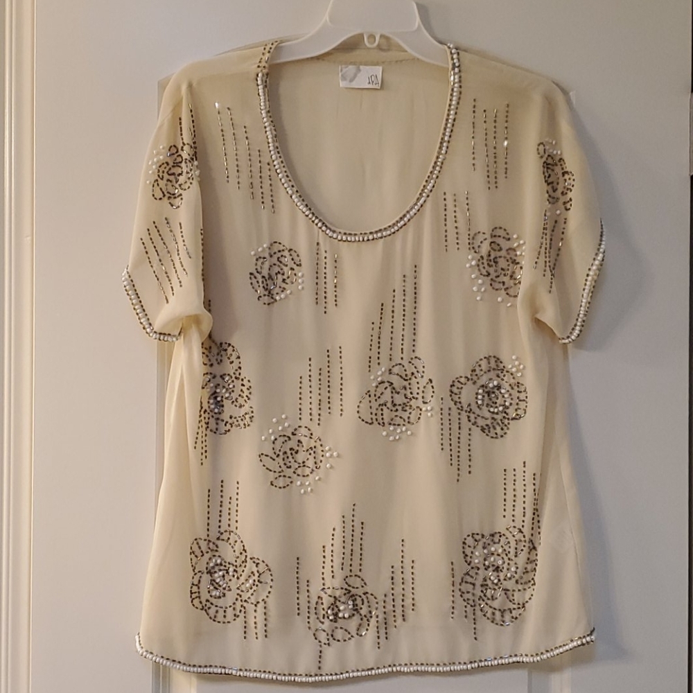 Shear blouse with beautiful beading detail